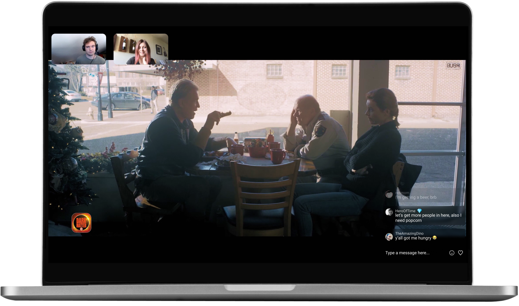 Laptop showing image of people around a table